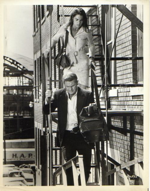 Ali MacGraw (as Carol McCoy) and 
Steve McQueen (as Doc McCoy) 
escape via the emergency stairwell.